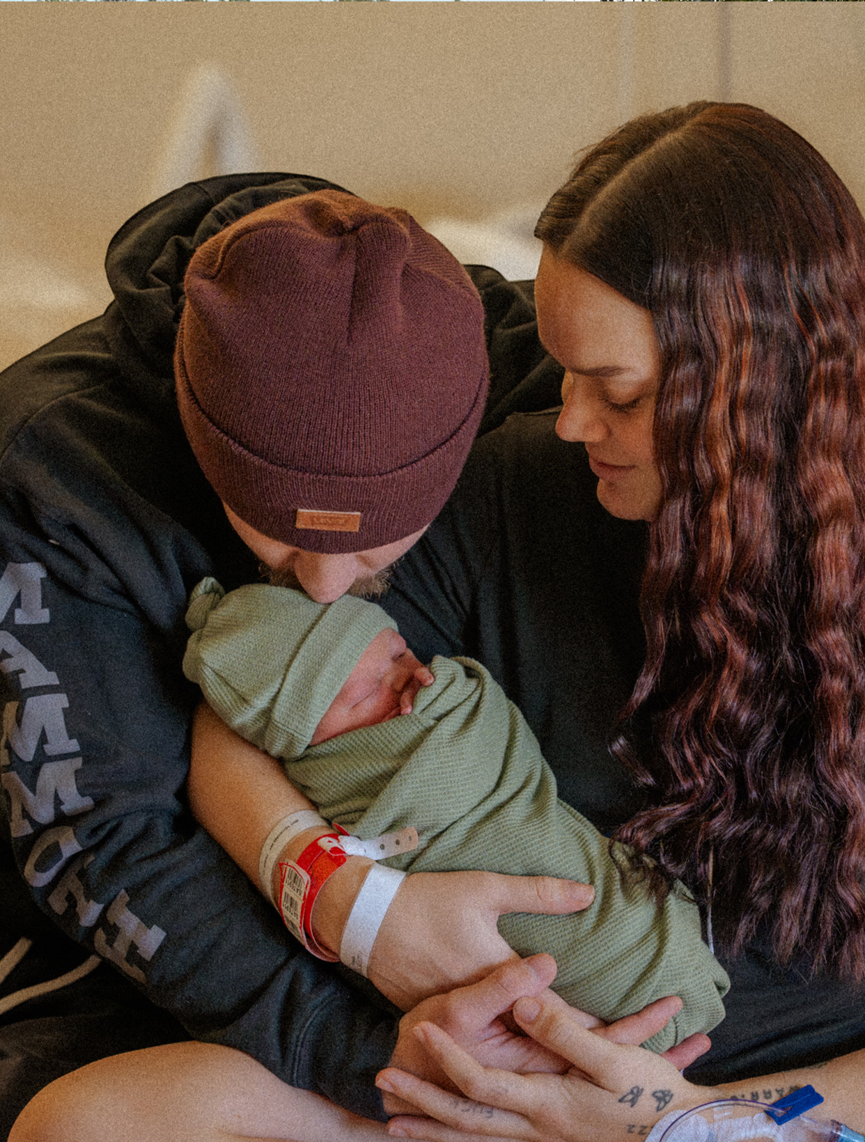Zach and Maddy Wolfe with their newborn